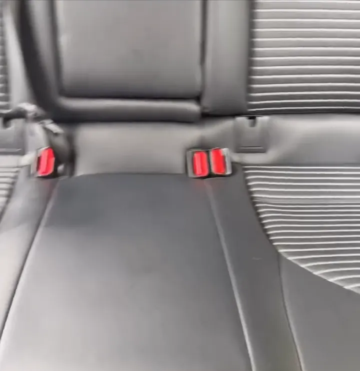 Clean rear bench seat after an interior detail on a car in Toledo, Iowa